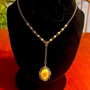 1928 necklace with pendant, gold chain and  small pearls.